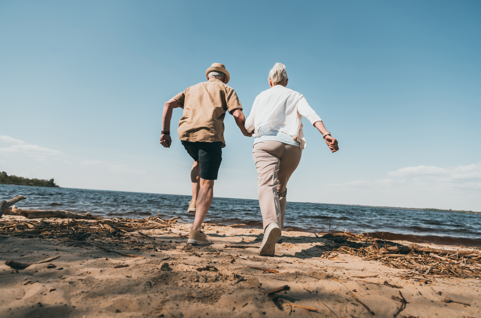 retirement-pension-couple-beach-sea-holiday.png